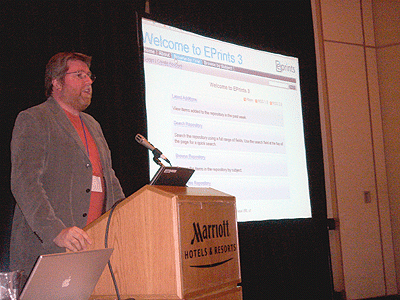 photo (99KB) : Les Carr launching Eprints 3.0, courtesy of Jessie Hey